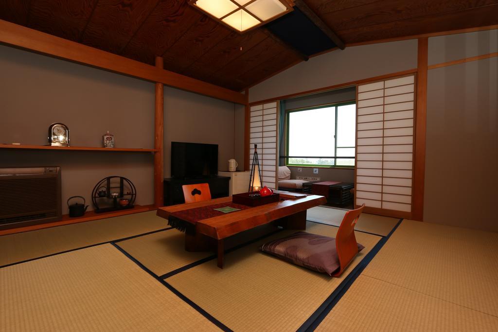 Hotel Minamikaikisen Ито Стая снимка